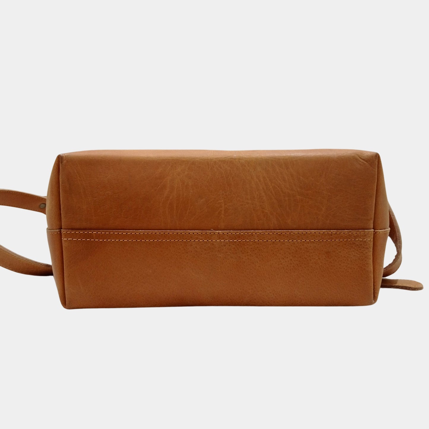 Bottom of Brown Olivia leather tote bag by LTB showing fine stitching at bottom seam
