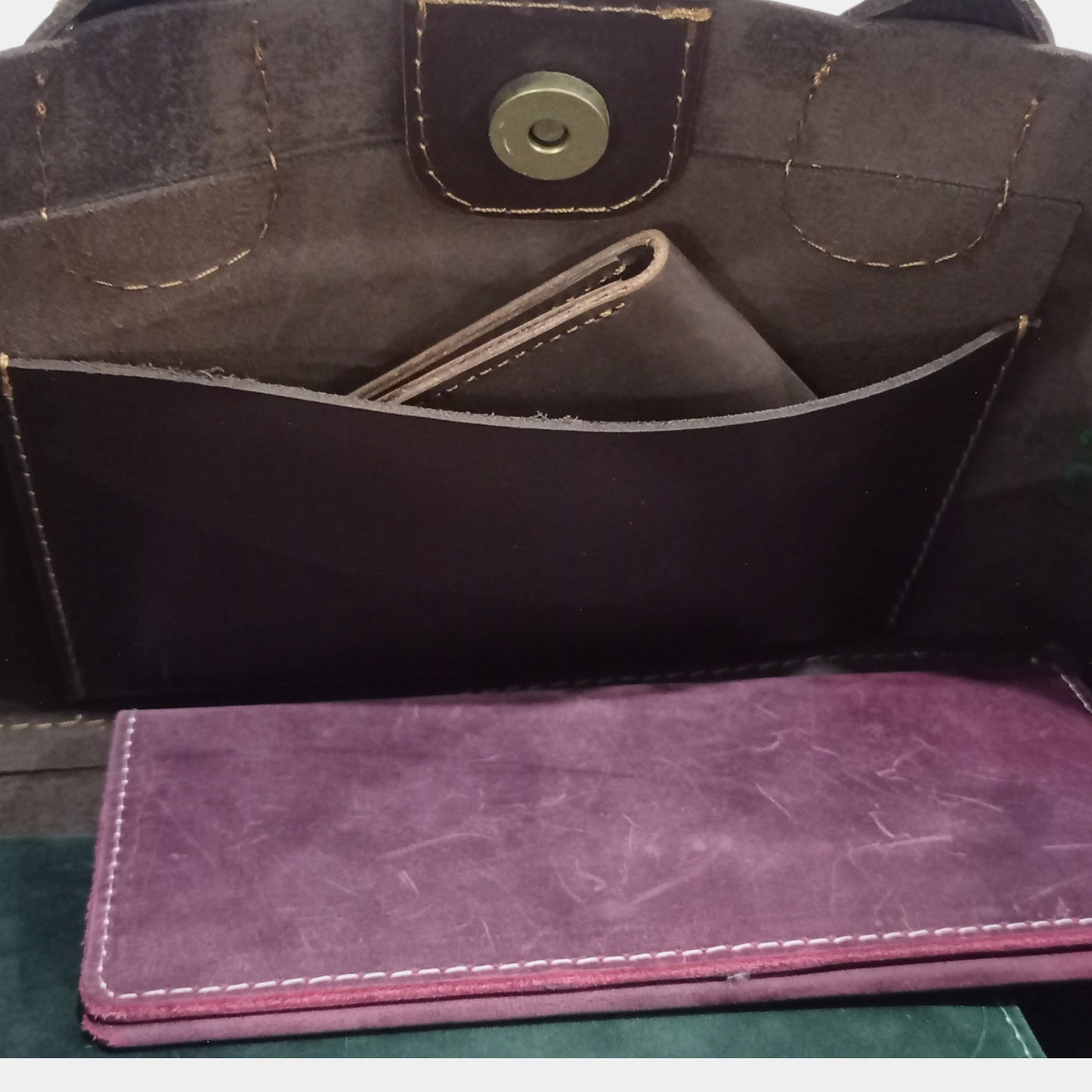 Inside Sienna Leather Tote showing Side sling pocket having card holder and long wallet passport holder