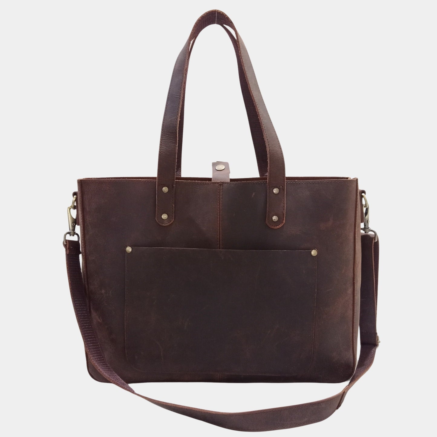 Timeless Brown leather work bag with formal appeal featuring adjustable strap that is removable