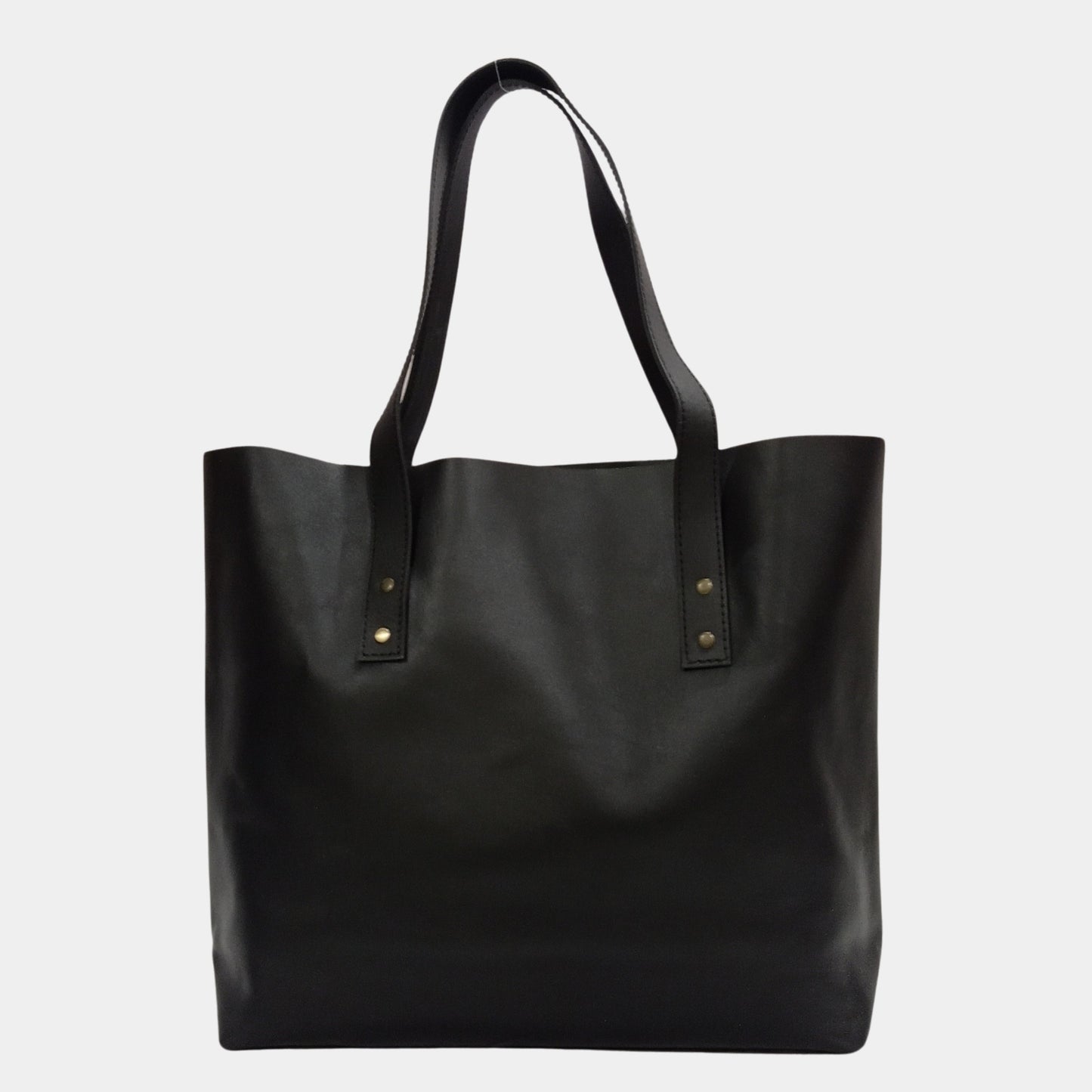 Back side of roomy black hazel leather tote by LTB store Australia with large handles