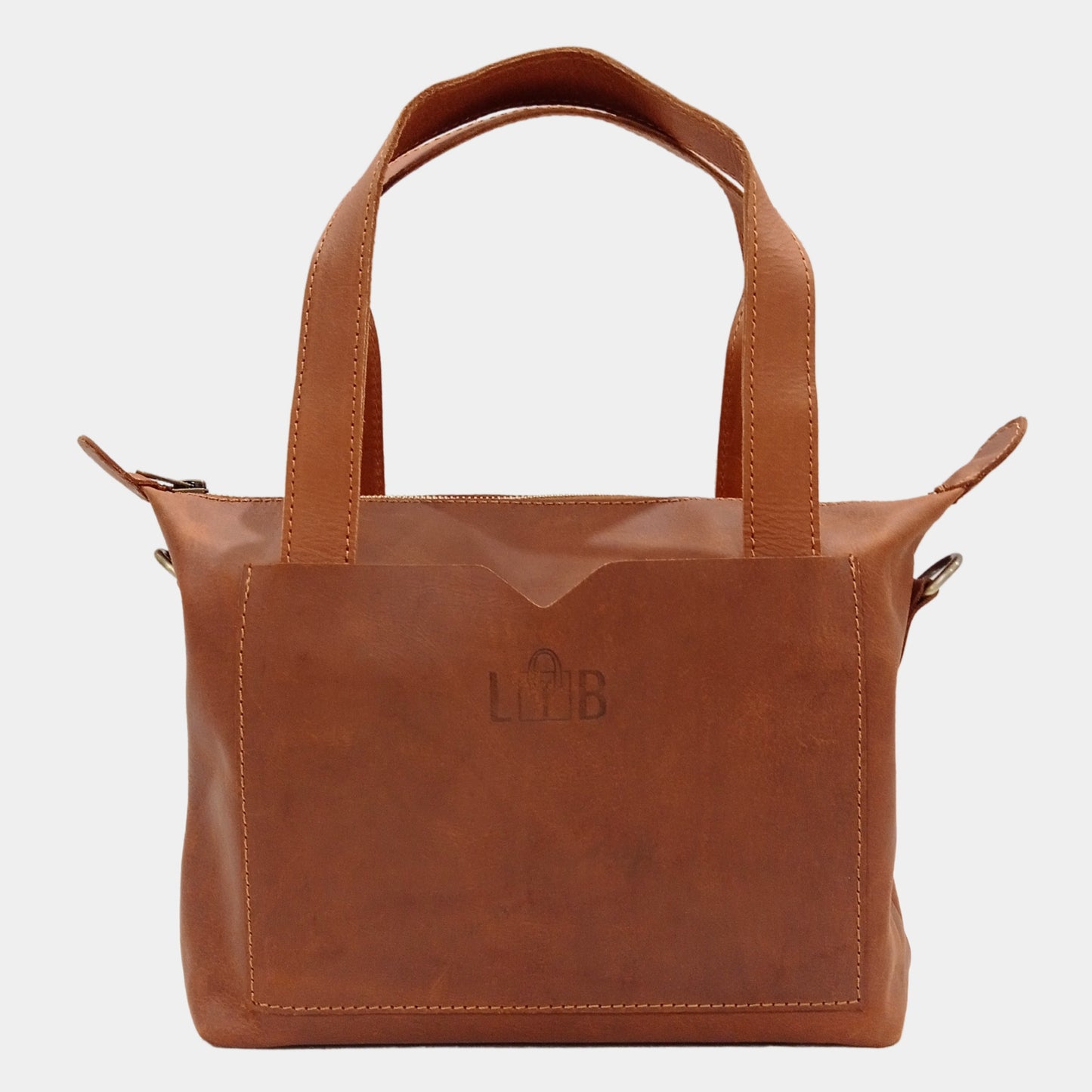 Small brown leather tote with dual line grip handles spacious front pocket and secure YKK zippers