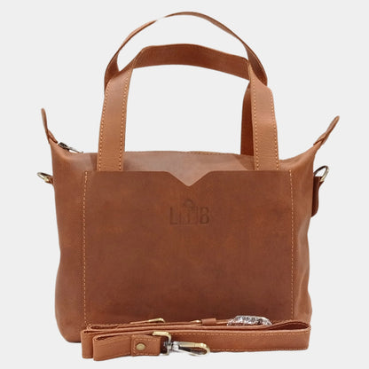 Small sleek and stylish tote for office with secure zip top closure and removable leather straps