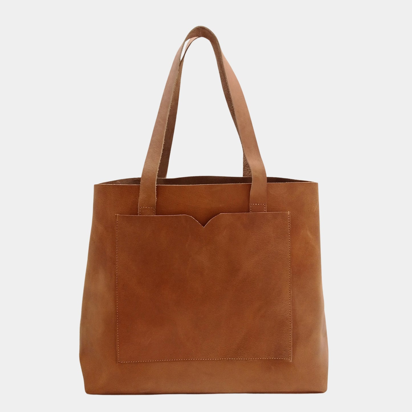 Classic brown leather tote crafted from premium crazy horse leather with spacious front pocket 