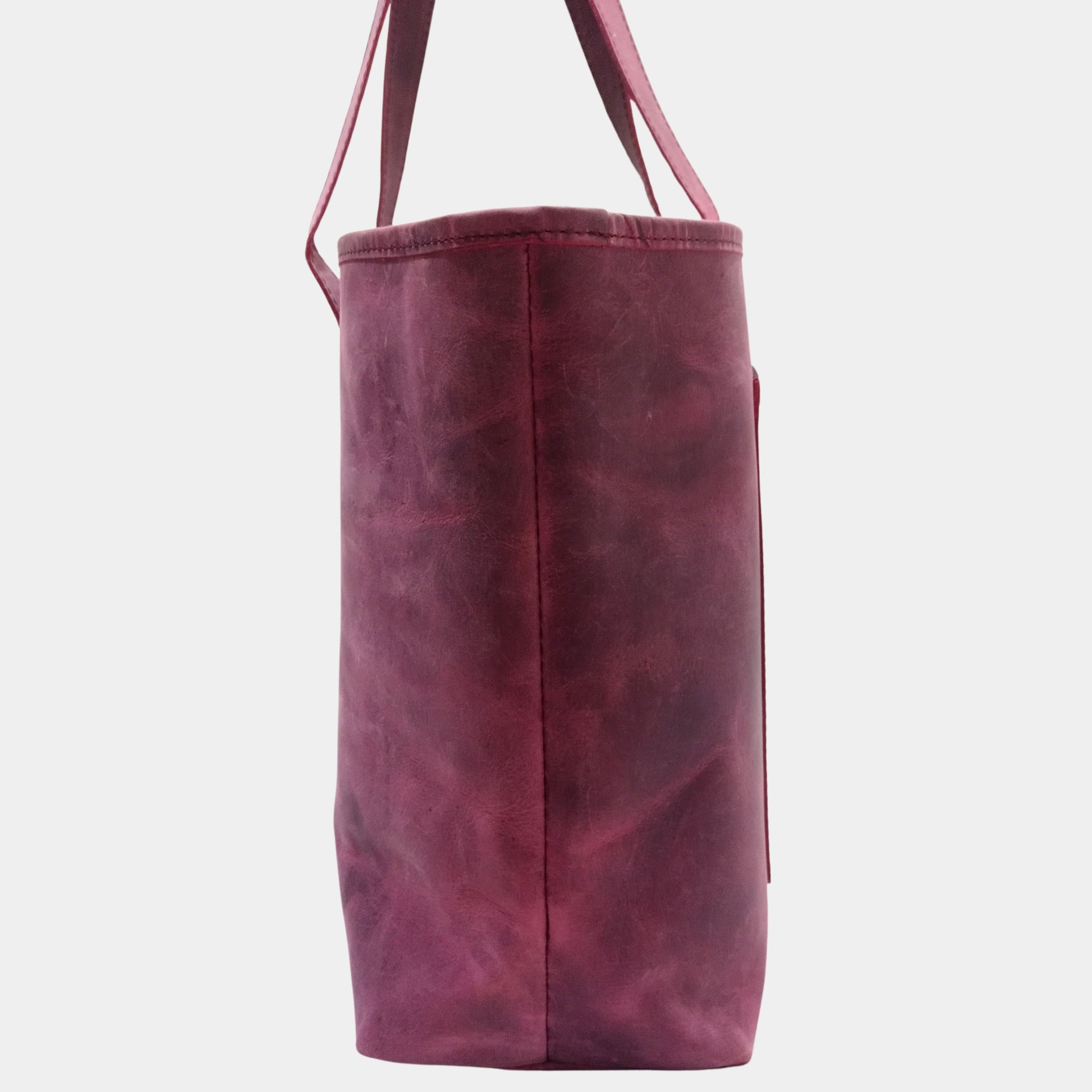 Side View of Large office burgundy Leather Tote by LTB with ergonomic dual lined handles 