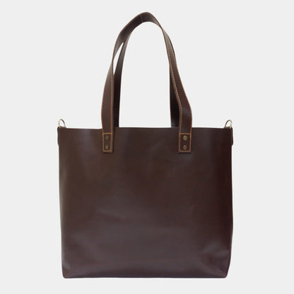 Backside of Ruby Dark Brown Leather Tote showing Brass Hardware and dual lined handles