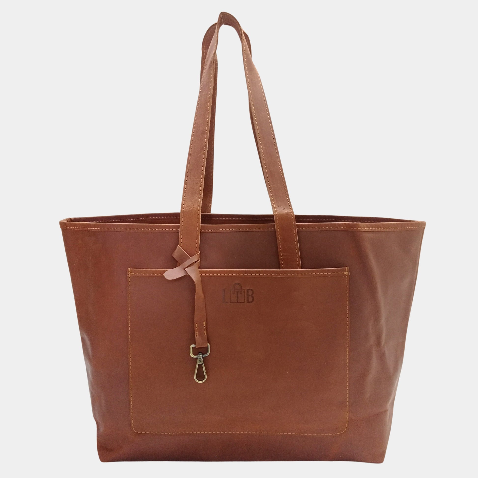 Stylish Brown leather work tote by TLB Australia featuring front pocket and brass accessory strap 