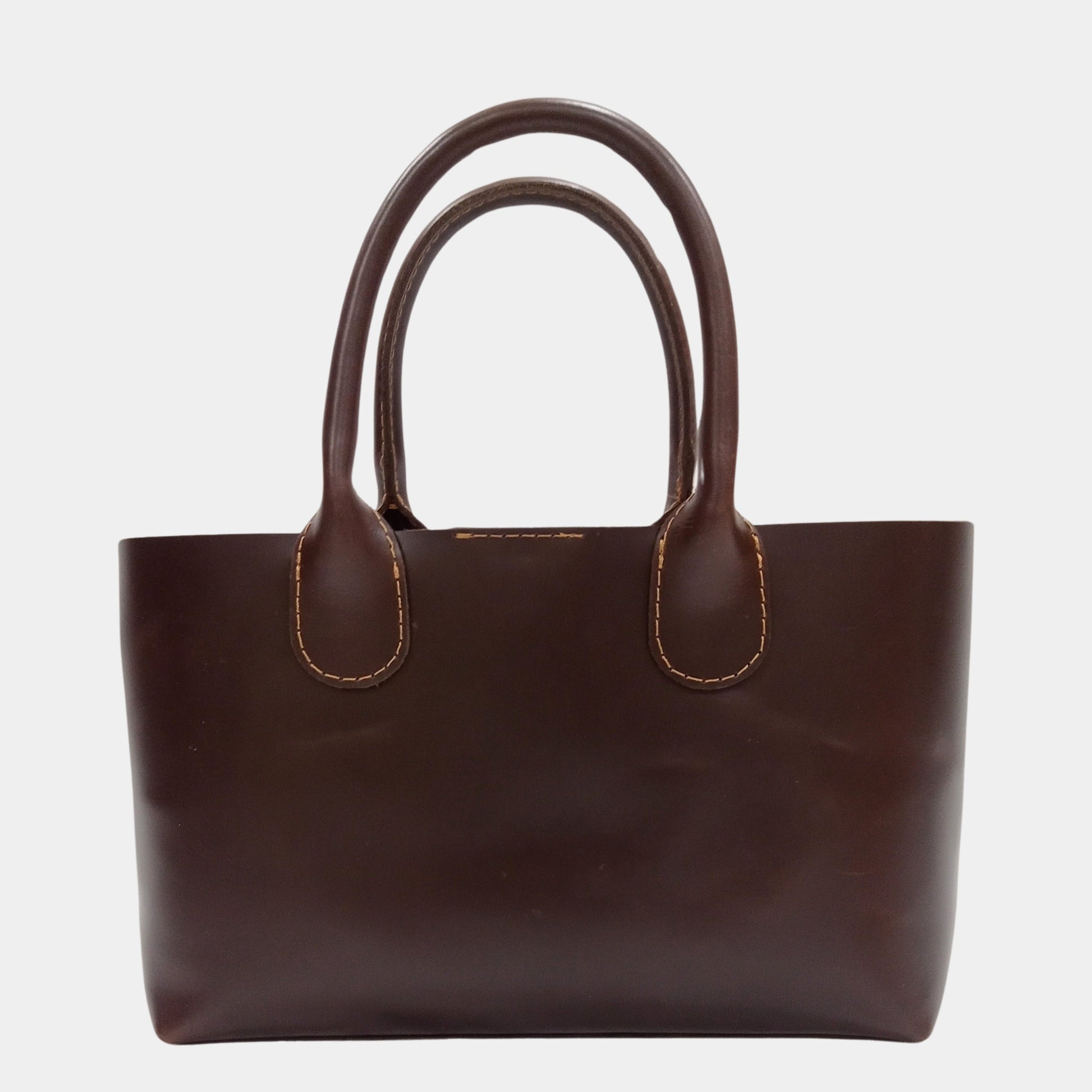 Backside of Small Dark Brown Leather Tote With elegant grab handles take it as handbag conveniently