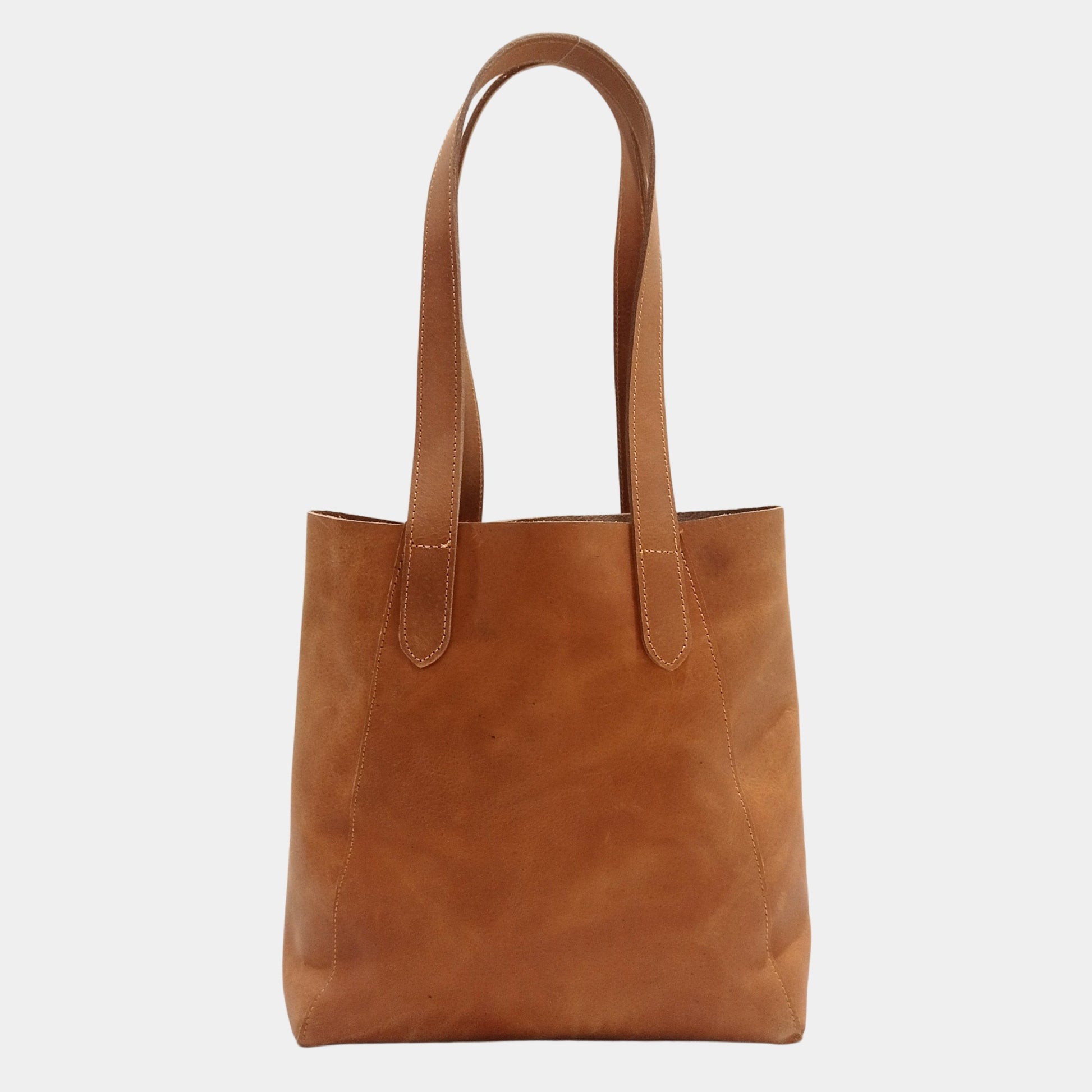 Backside of small brown tote showing fine leather stitching versatile Bag for Australian women